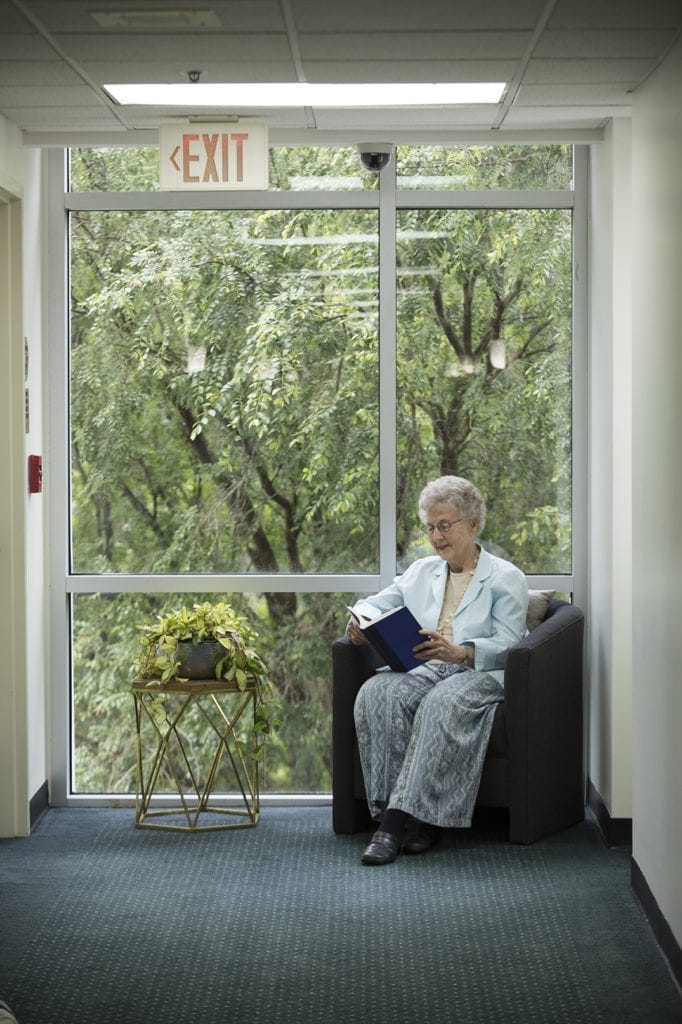 Reading by the window