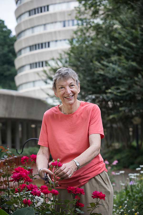 woman with flowers outside